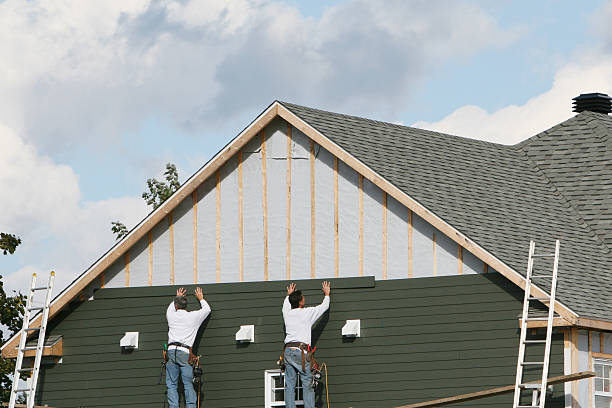 Professional Siding Replacement technician working in De Mossville, KY